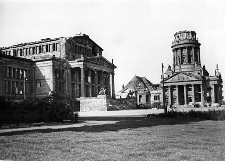 View of destroyed cathedral and concert hall in black and white