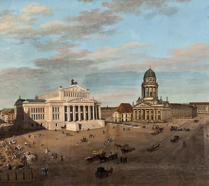 Gendarmenmarkt with concert hall and French Cathedral to be seen, with many horses and people on the square.